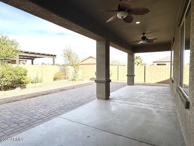 view of patio with ceiling fan