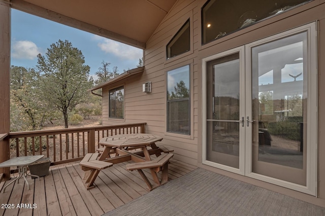 wooden deck featuring french doors