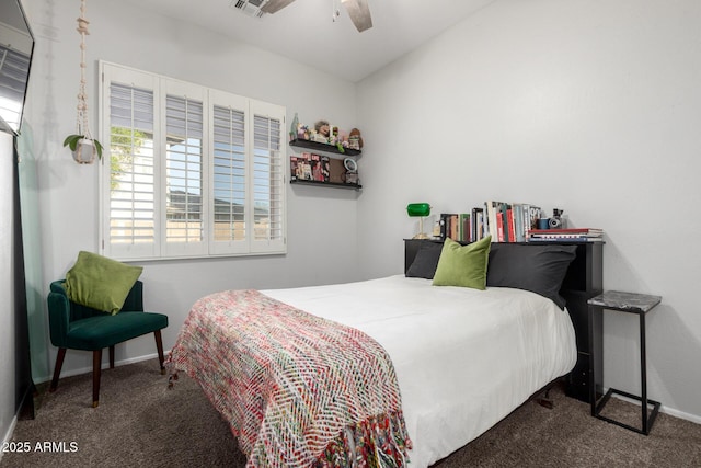 4618 W Pokeberry Ln, Phoenix, AZ 85083 - carpeted bedroom featuring baseboards and a ceiling fan