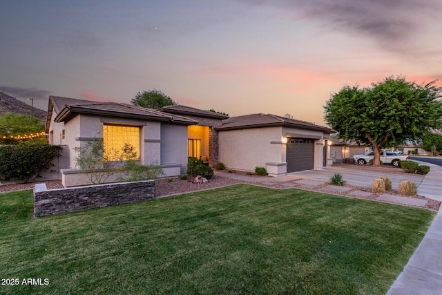 4618 W Pokeberry Ln, Phoenix, AZ 85083 - prairie-style house with stucco siding, a front yard, driveway, and an attached garage