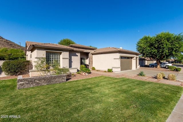 4618 W Pokeberry Ln, Phoenix, AZ 85083 - prairie-style house featuring an attached garage, stucco siding, and a front yard