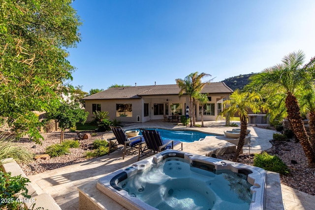 4618 W Pokeberry Ln, Phoenix, AZ 85083 - outdoor pool with an outdoor hot tub, a ceiling fan, and a patio