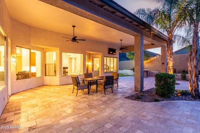 4618 W Pokeberry Ln, Phoenix, AZ 85083 - fenced backyard with a patio area, ceiling fan, and outdoor dining space