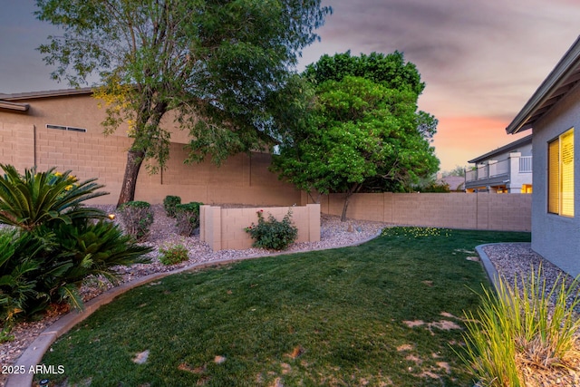 4618 W Pokeberry Ln, Phoenix, AZ 85083 - yard at dusk with a fenced backyard