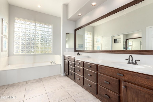 4618 W Pokeberry Ln, Phoenix, AZ 85083 - full bathroom with double vanity, a garden tub, tile patterned flooring, and recessed lighting