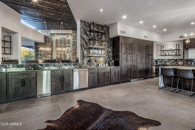 kitchen featuring visible vents, dark brown cabinets, dishwasher, and open shelves