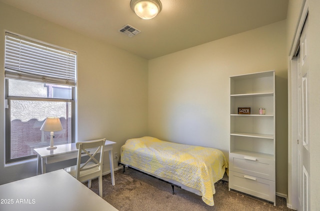 bedroom featuring visible vents and carpet flooring