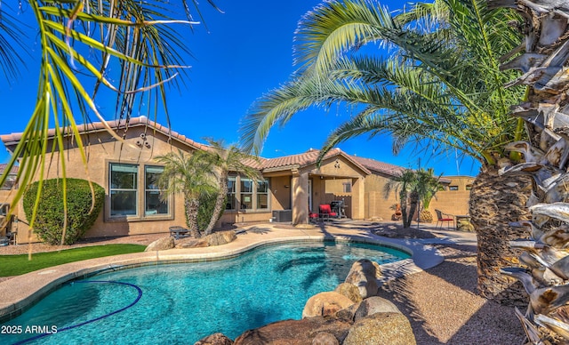 pool featuring a patio area