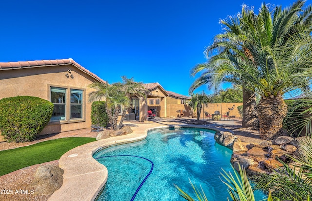 view of pool featuring a fenced in pool, a patio area, and fence