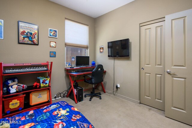 interior space with light colored carpet and baseboards