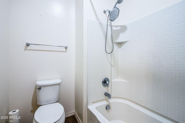 full bathroom featuring shower / bathtub combination, toilet, and baseboards