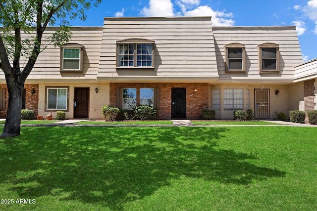 6743 S Jentilly Ln, Tempe, AZ 85283 - view of front of home with a front lawn and brick siding