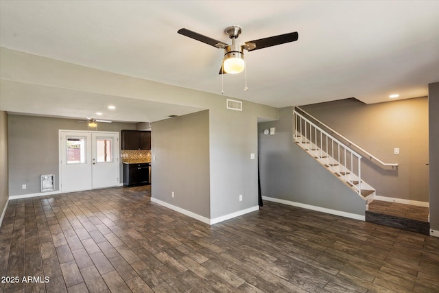 6743 S Jentilly Ln, Tempe, AZ 85283 - unfurnished living room featuring ceiling fan, visible vents, and baseboards