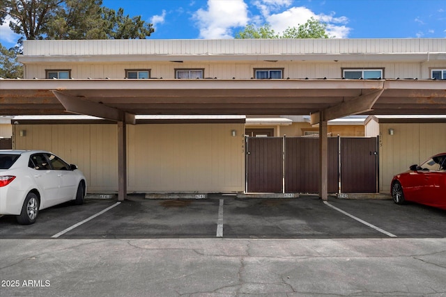 6743 S Jentilly Ln, Tempe, AZ 85283 - covered parking lot featuring fence