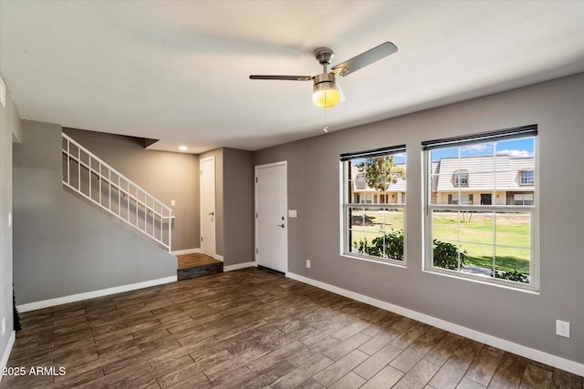 6743 S Jentilly Ln, Tempe, AZ 85283 - foyer with stairway, baseboards, a ceiling fan, and dark wood finished floors