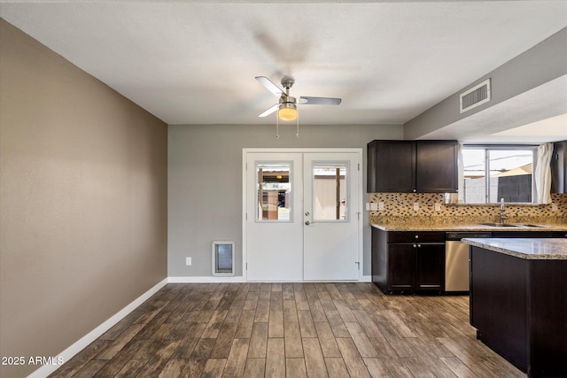 6743 S Jentilly Ln, Tempe, AZ 85283 - kitchen featuring ceiling fan, visible vents, stainless steel dishwasher, a sink, and dark wood-type flooring