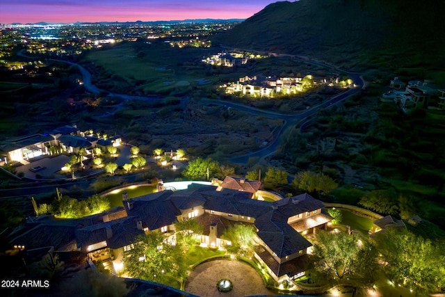 aerial view at dusk with a mountain view