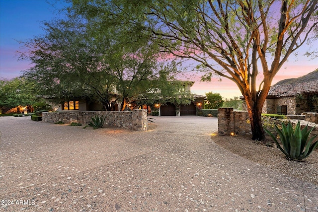 view of property exterior at dusk