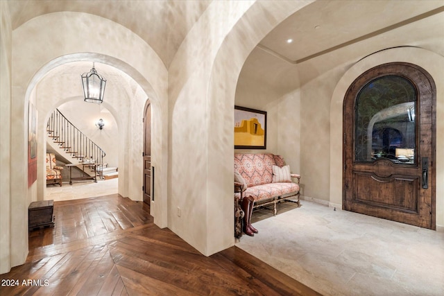 foyer entrance with parquet flooring