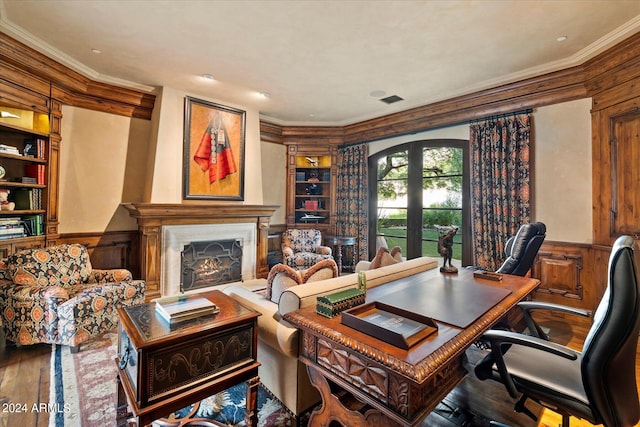 home office with ornamental molding, hardwood / wood-style floors, and french doors