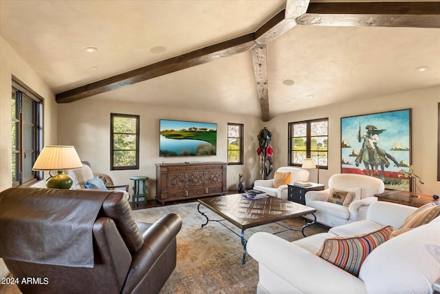 living room with hardwood / wood-style floors and beam ceiling