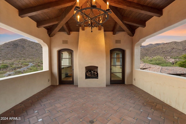 exterior space featuring a patio area and a mountain view