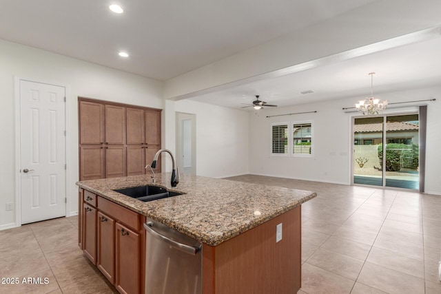 kitchen with a sink, brown cabinetry, dishwasher, light tile patterned floors, and recessed lighting