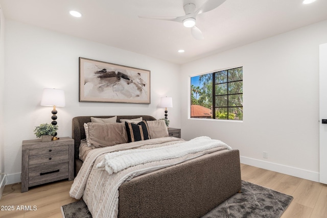 bedroom featuring baseboards, a ceiling fan, recessed lighting, and light wood-style flooring