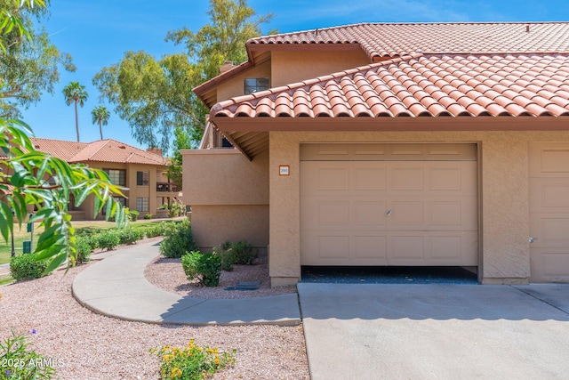 mediterranean / spanish home with stucco siding