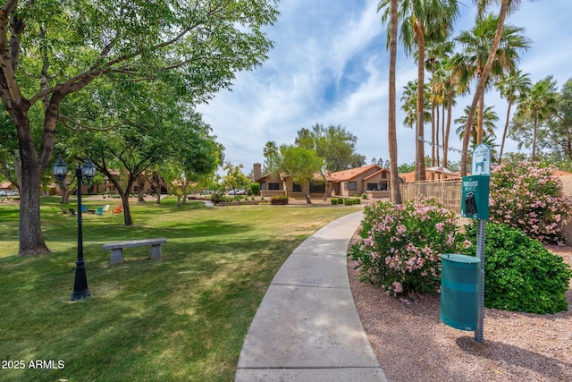 surrounding community with a yard