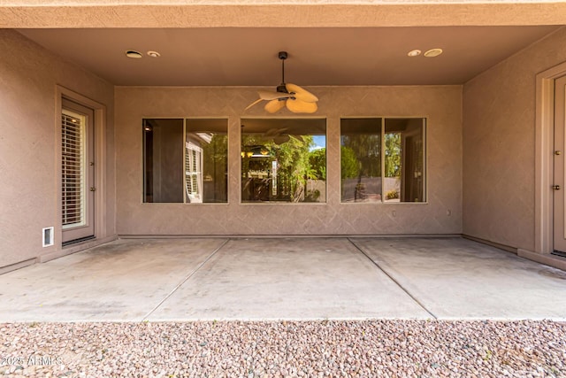 view of patio with a ceiling fan