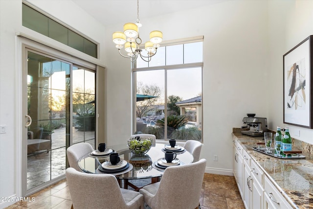 dining room featuring a notable chandelier