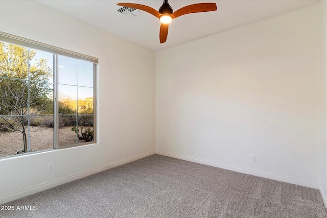 unfurnished room featuring carpet floors and ceiling fan