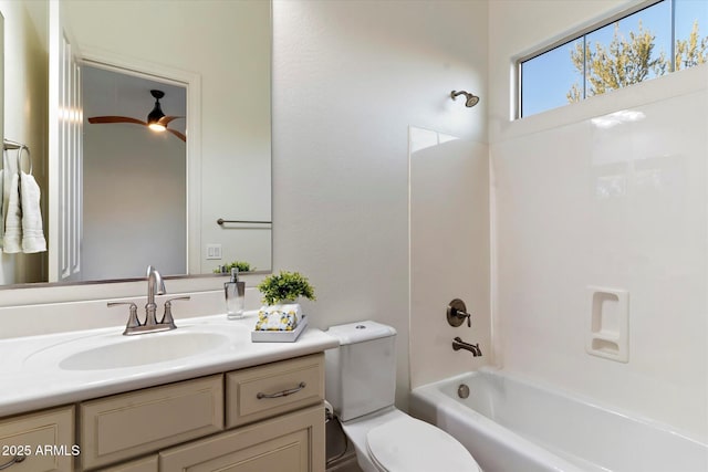 full bathroom with vanity, ceiling fan, shower / washtub combination, and toilet