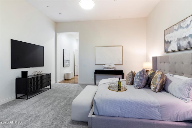 bedroom with light colored carpet