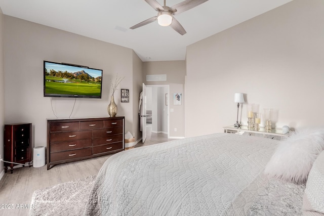 bedroom with ceiling fan and light hardwood / wood-style flooring