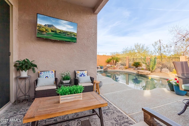 view of swimming pool with a patio area