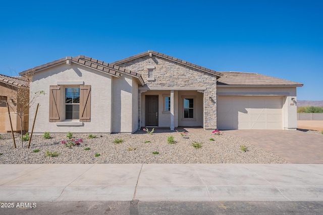 6728 N 190th Dr, Waddell, AZ 85355 - ranch-style home with stucco siding, a tile roof, driveway, and an attached garage