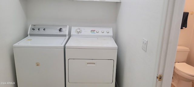 laundry area featuring independent washer and dryer