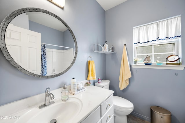 full bathroom with toilet, a shower with shower curtain, and vanity
