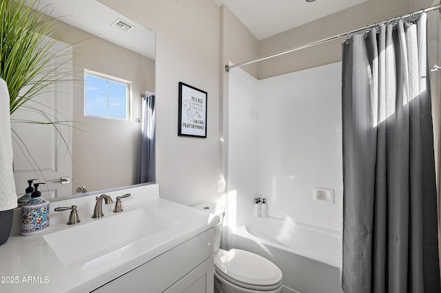 full bathroom with toilet, shower / bath combination with curtain, and vanity