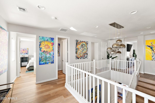 hallway featuring light hardwood / wood-style floors