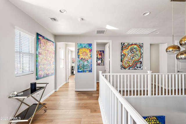 hall featuring light hardwood / wood-style flooring