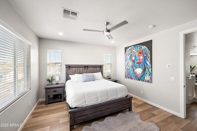 bedroom featuring ceiling fan and light wood-type flooring