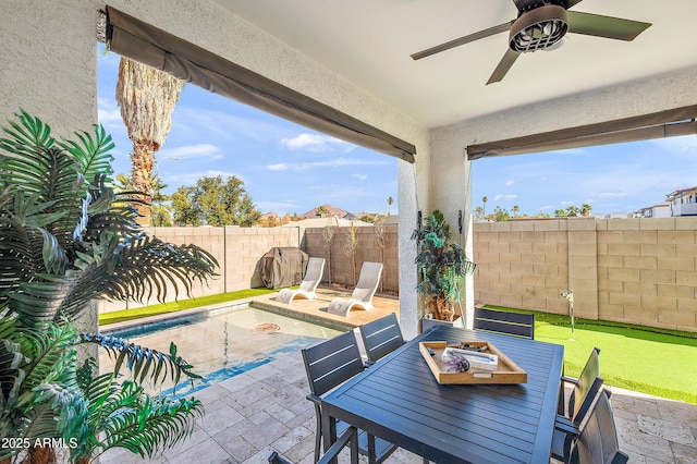 view of patio featuring ceiling fan