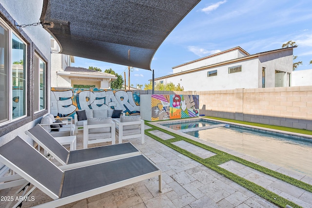 view of patio featuring an outdoor living space, a fenced in pool, and a playground