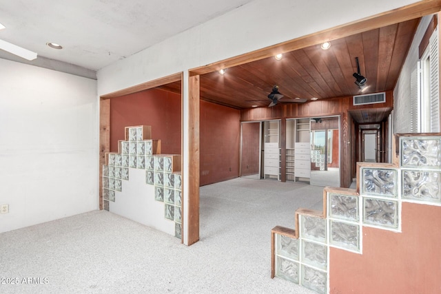 spare room with ceiling fan, recessed lighting, carpet floors, wood ceiling, and visible vents