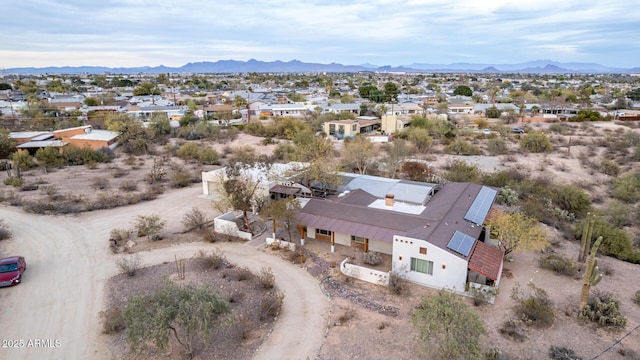 bird's eye view with a residential view and a mountain view