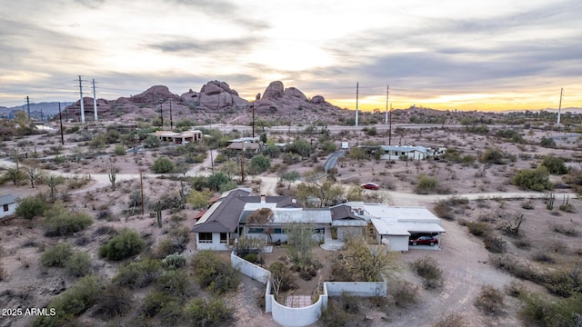 aerial view at dusk with a mountain view