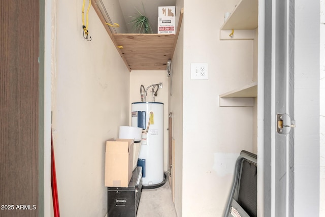 utility room featuring water heater